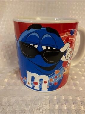 M&M's Blue Character Ceramic Mug, 4 inches high.
